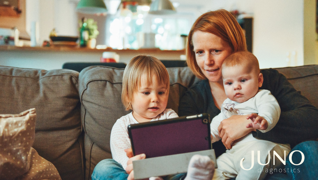 A newborn and a toddler inherited physical traits from their mother's genetics